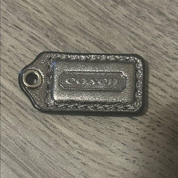 Coach Handbags - Coach Metallic Silver mini Leather Key Tag Charm